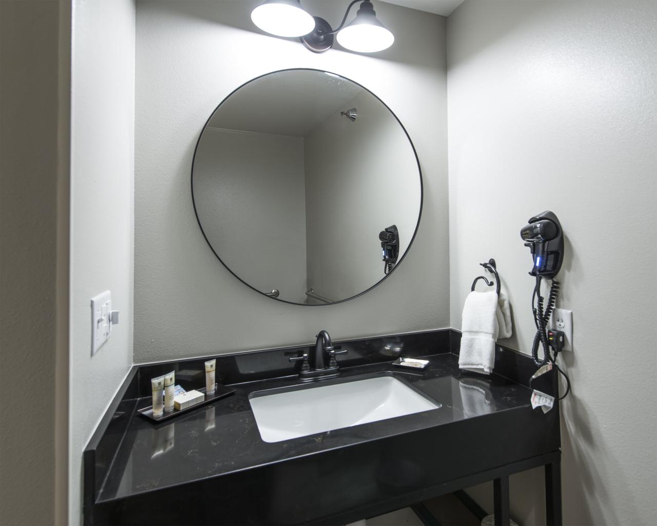 A view of the vanity and sink area in the family room at Ozark Folk Center State Park